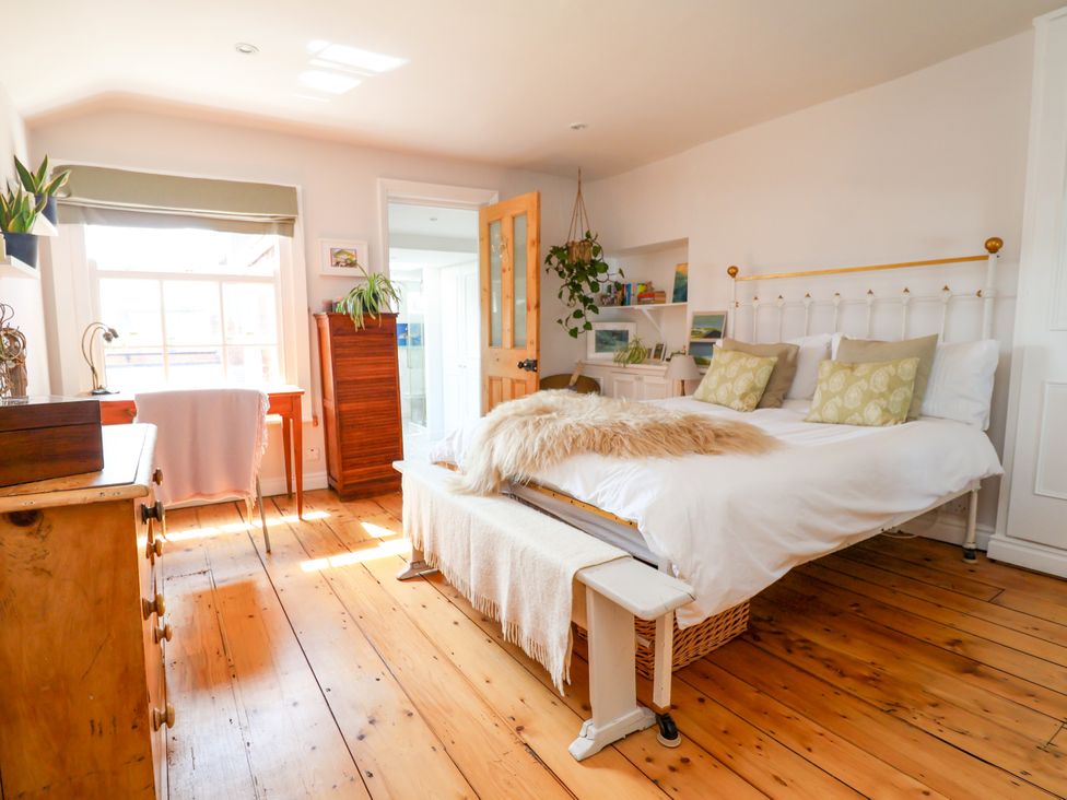 A bedroom with a bed and furniture at 34 Eaton Road Chester