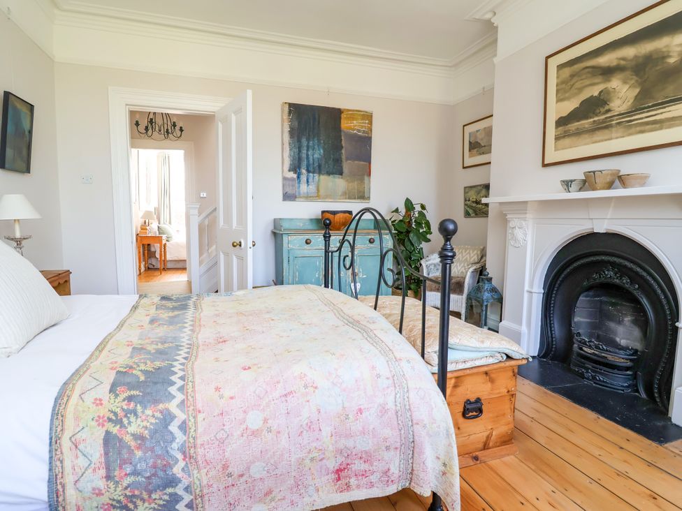 A bedroom with a bed and bedside table at 34 Eaton Road in Chester