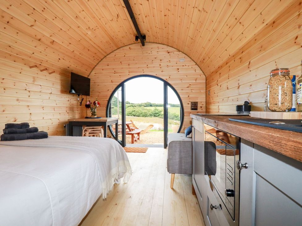 A studio with bed and kitchenette at Stargaze in Truro