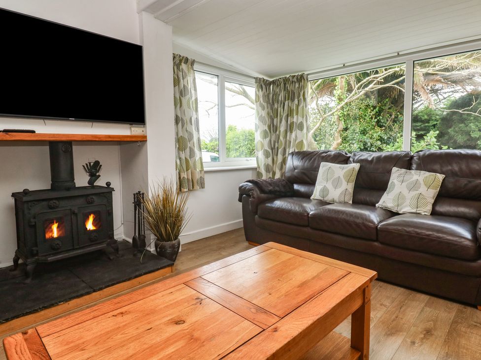 A living room with a sofa and television at Tinners Way Tresowes near Ashton