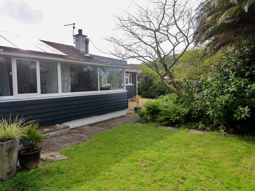 A garden with grass and a tree at Tinners Way in Tresowes near Ashton
