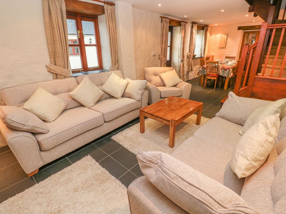 A living room with sofas and a coffee table at Maerdy Cwtch in Haverfordwest