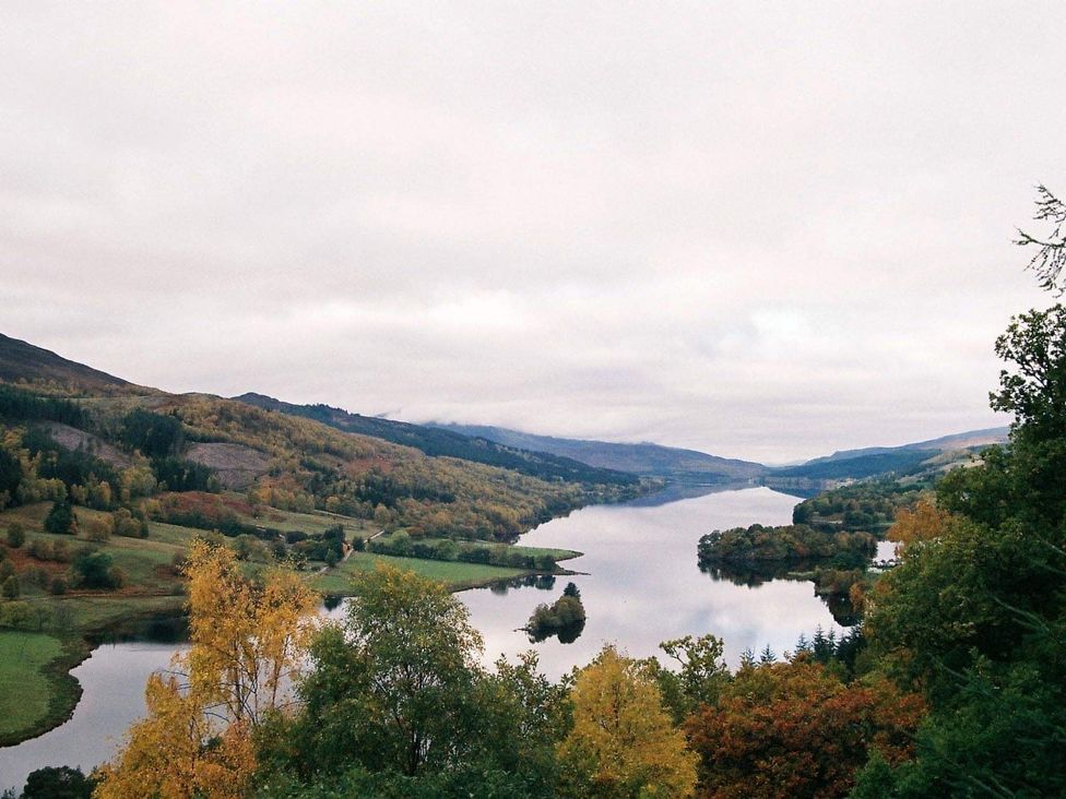 A river flowing through hills and forests at Stylish Highland retreat in the heart of town, Pitlochry