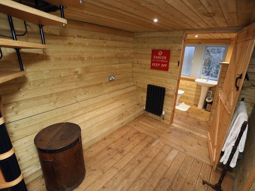 A bathroom with a toilet and sink at Hapus Yurt - Two Beautiful Yurts and Barn Cottage
