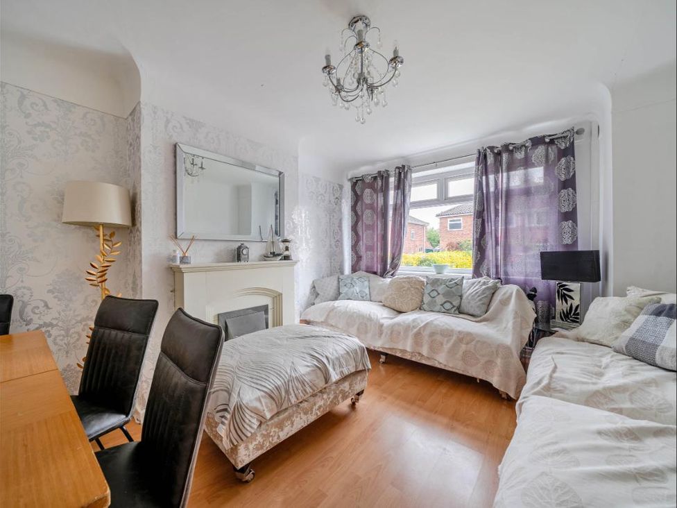 A living room with a dining table and sofas at Village retreat with canal walk into Chester in Christleton