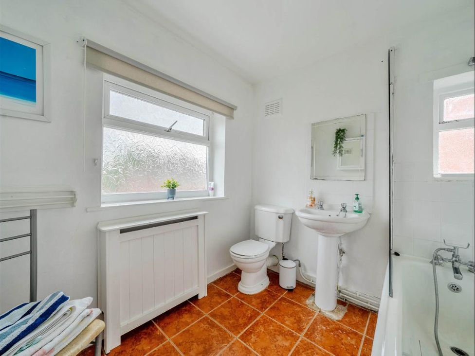 A bathroom with a sink and toilet at Village retreat with canal walk into Chester in Christleton