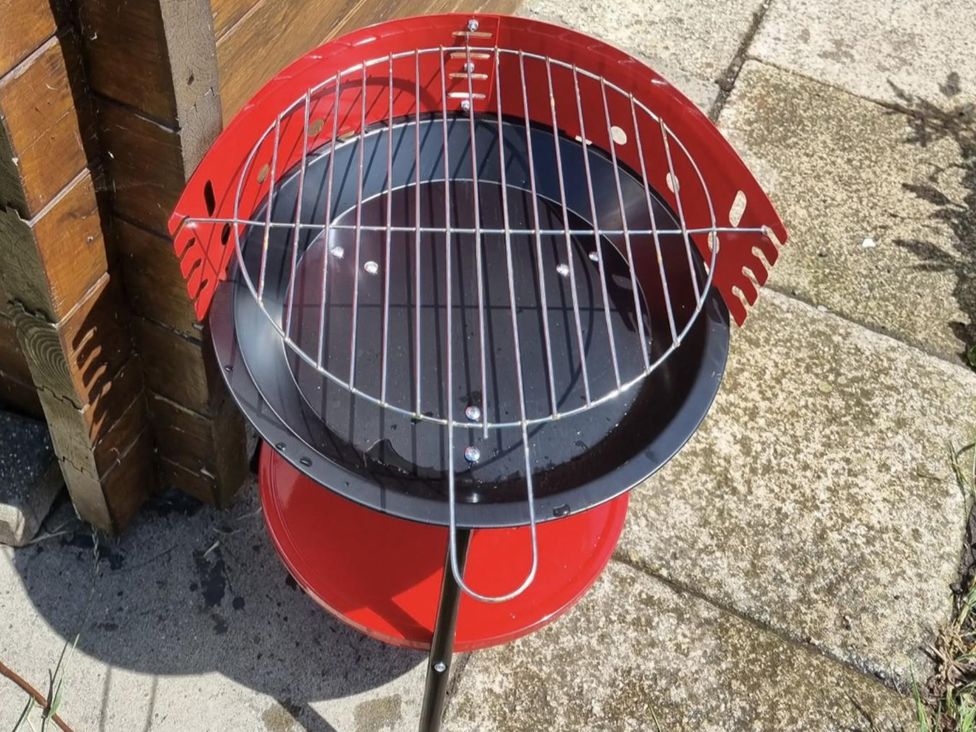 A grill on a patio at tbc 