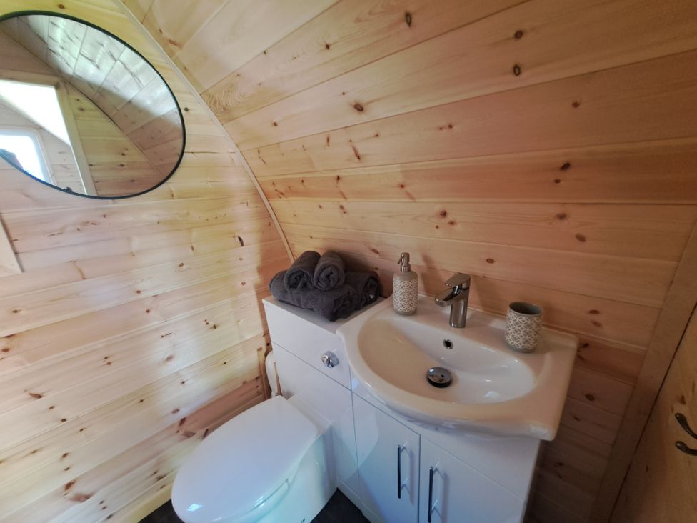 A bathroom with a sink and toilet at tbc in 
