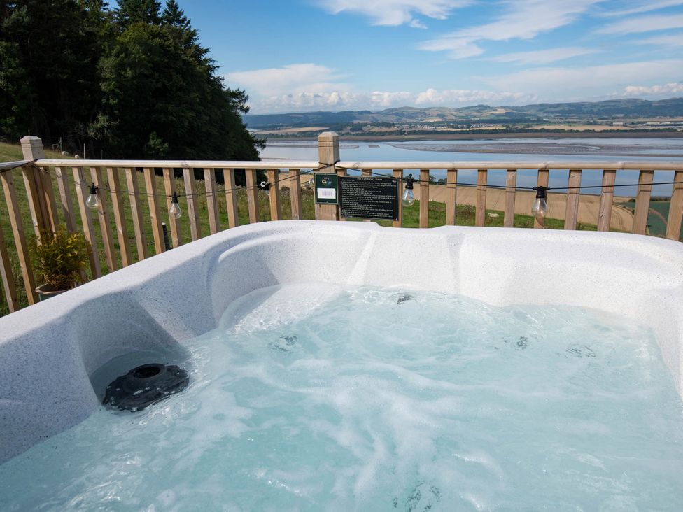 A hot tub with water and a view at tbc in 
