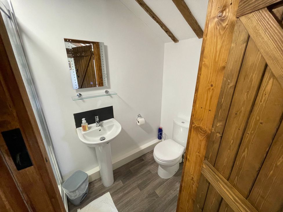 A bathroom with a sink and toilet at tbc