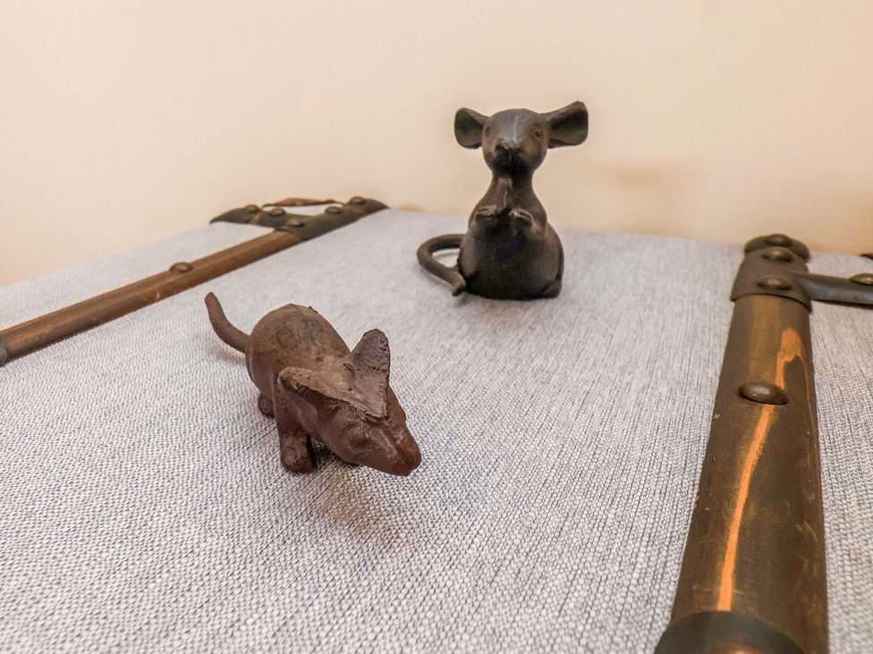 Decorative metal figures on a trunk at Lamb Cottage Stockton-On-Tees