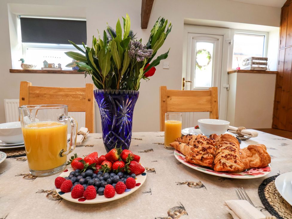 A dining room with a table set for breakfast at Lamb Cottage Stockton-On-Tees