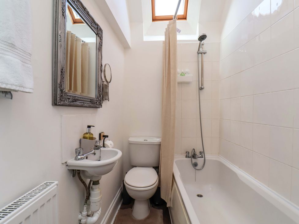 A bathroom with a shower and bathtub at Lamb Cottage Stockton-On-Tees