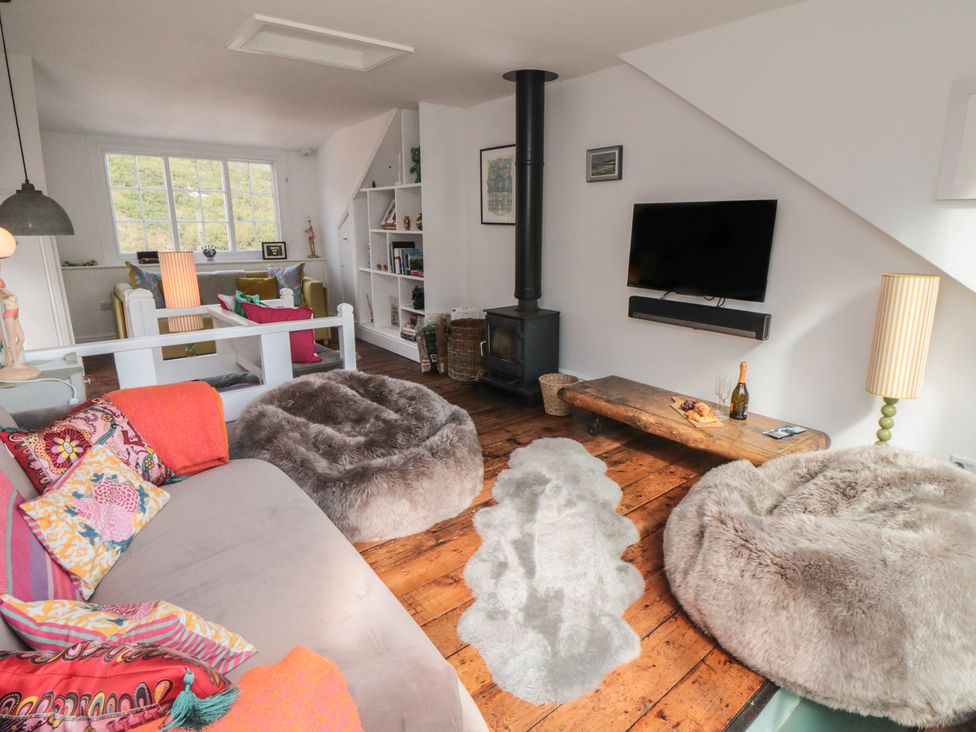 A living room with a sofa and a television at Hillsover in Saltburn-by-the-Sea