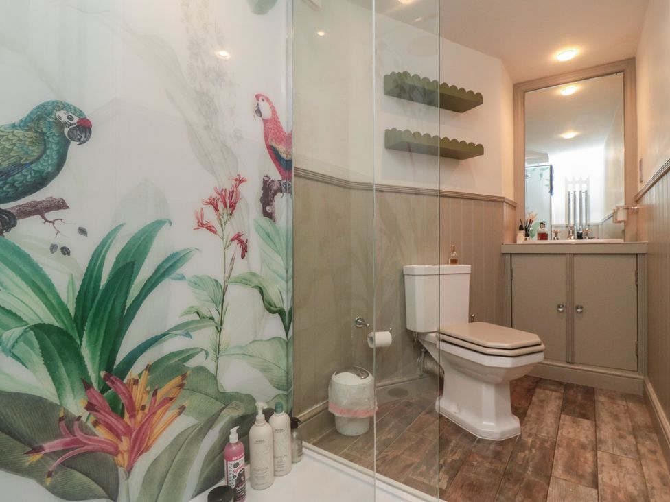 A bathroom with a shower and toilet at Hillsover in Saltburn-by-the-Sea