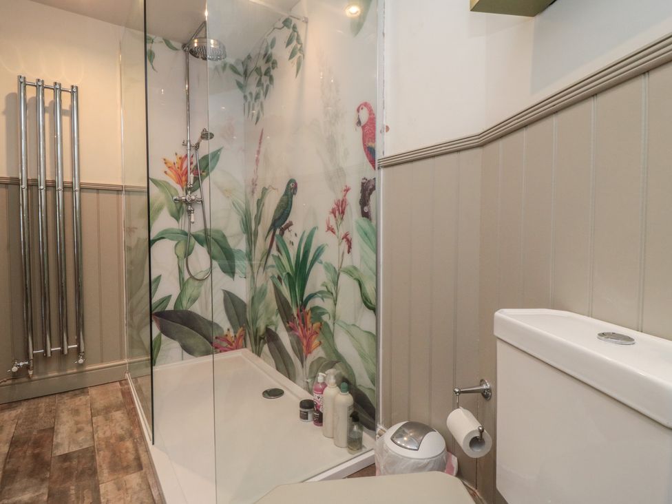 A bathroom with a shower and toilet at Hillsover in Saltburn-by-the-Sea