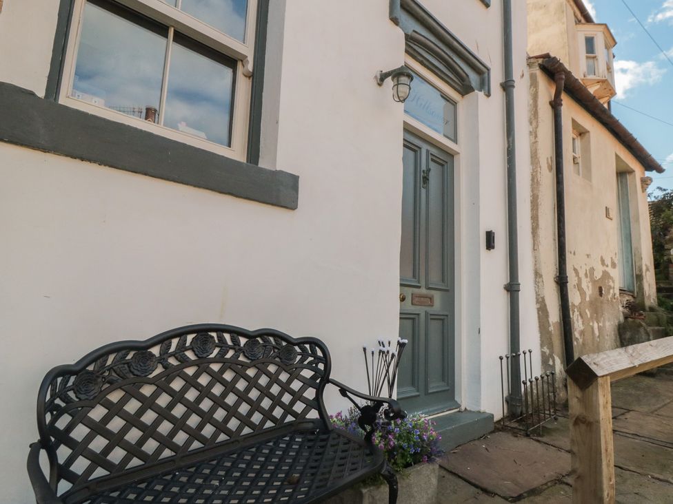 A bench and door at the entrance of Hillsover in Saltburn-by-the-Sea