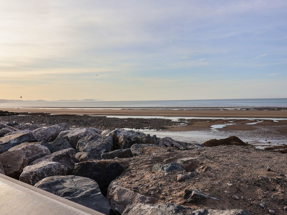 A rocky shoreline by the ocean at Away Resorts - Golden Sands Holiday Park, Rhyl