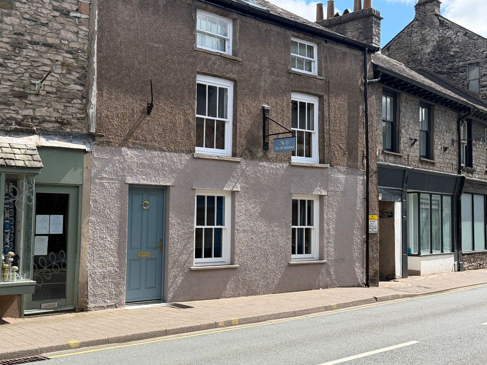 A building exterior with windows and a door at The Old Bakehouse in Kendal