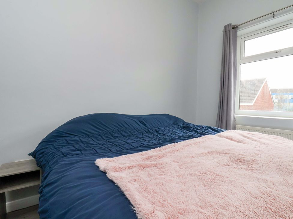 A bedroom with a bed and a window at 122B Norton Road Stockton-on-Tees