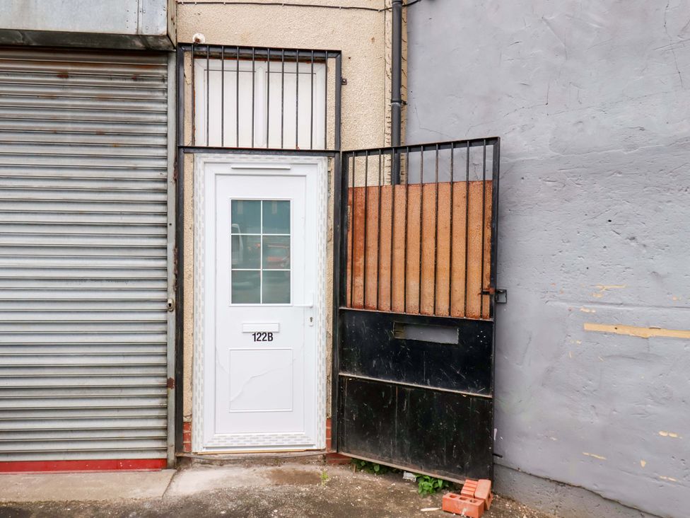 A door and metal gate at 122B Norton Road Stockton-on-Tees