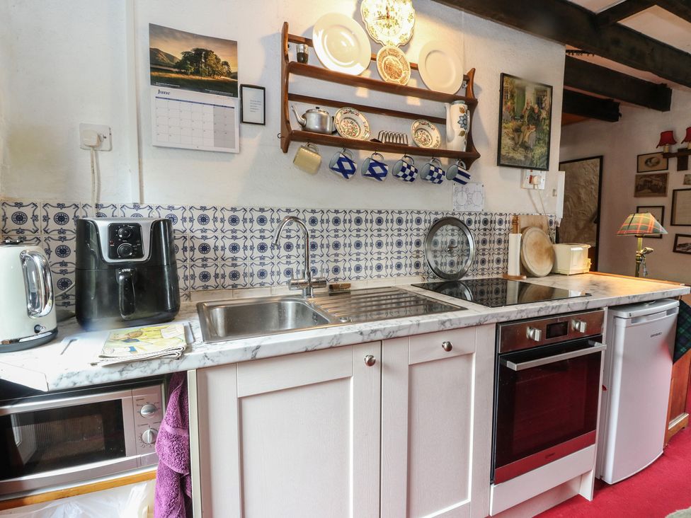 A kitchen with various appliances and utensils at 4 Whiterow Kentallen near Ballachulish