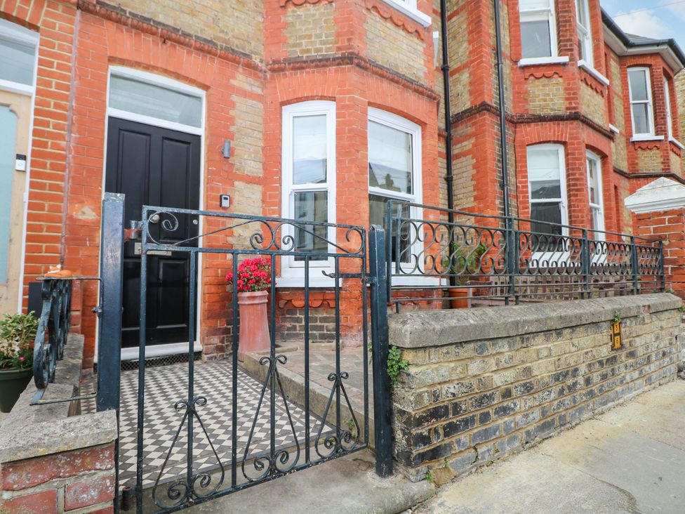 An entrance with a gate and flower pot at Tickety-Boo in Broadstairs