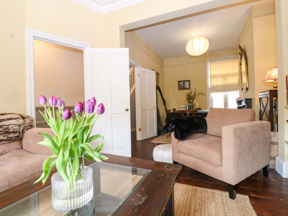 A living room with a sofa and a coffee table at Tickety-Boo in Broadstairs