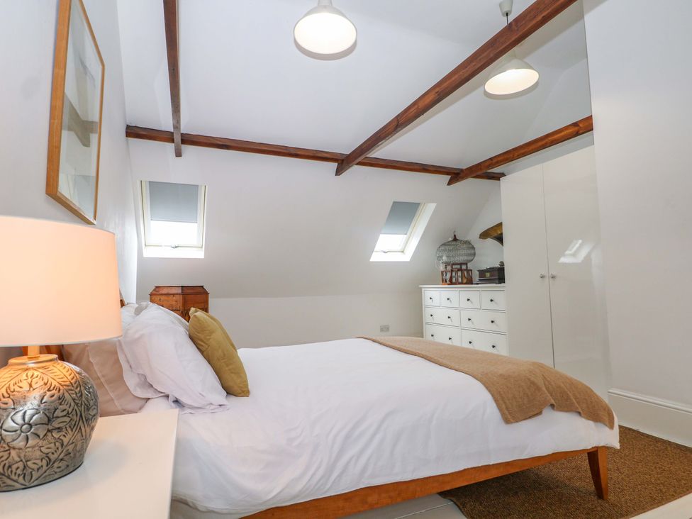 A bedroom with a bed and furniture at Tickety-Boo in Broadstairs