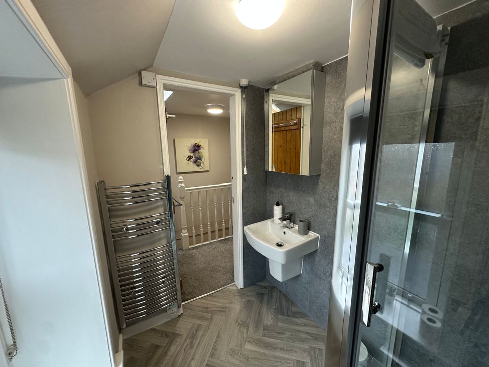A bathroom with a sink and shower at The Teviot in Kelso