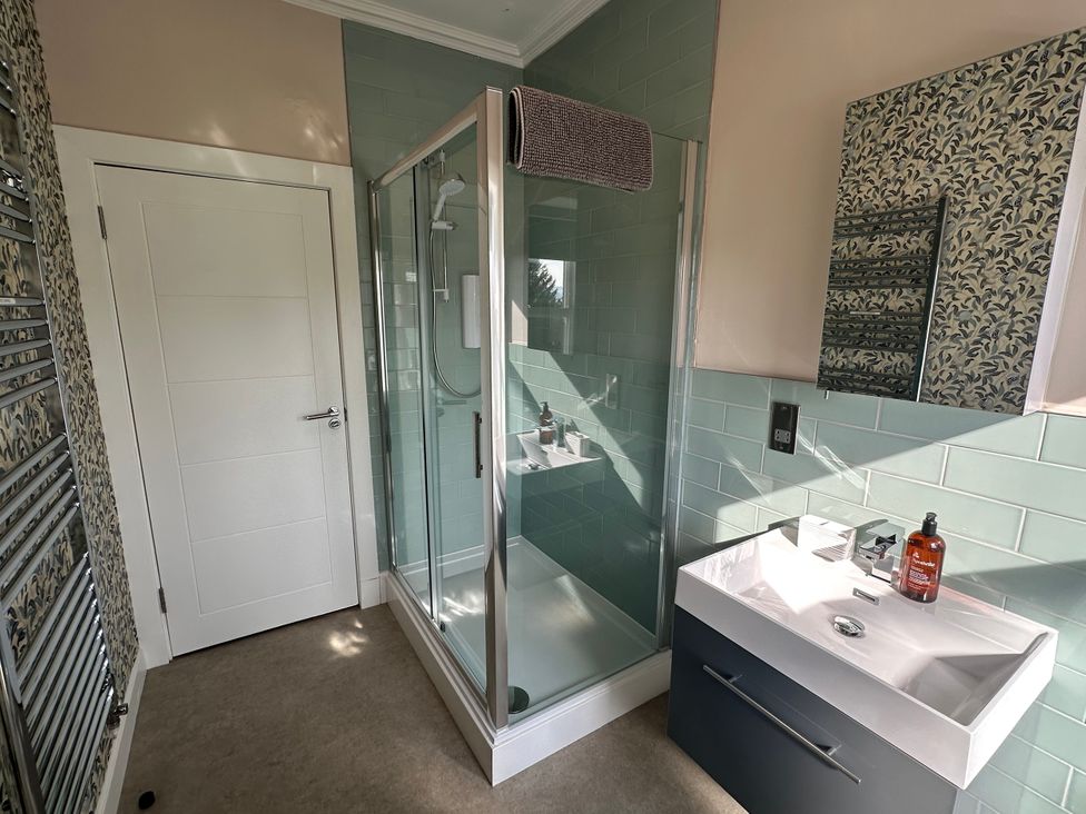 A bathroom with a shower and sink at Broombank Melrose