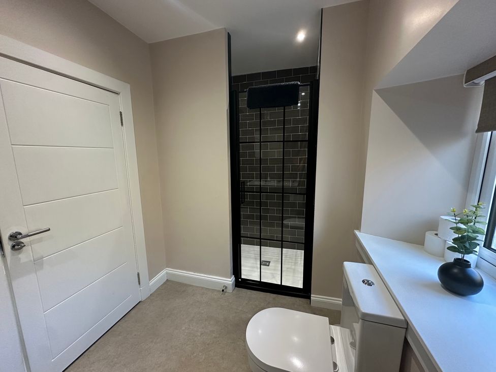 A bathroom with a shower and toilet at Broombank Melrose
