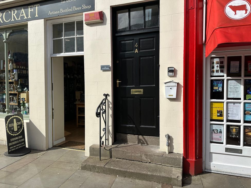 A door and shop front at Horsemarket in Kelso