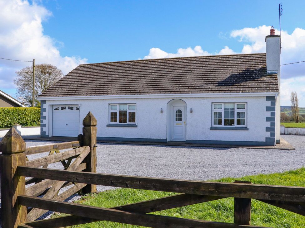 A house with a garage and front door at BREAGHMORE