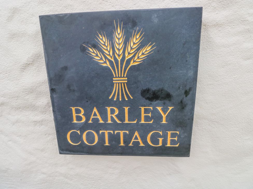 A sign displaying the name Barley Cottage