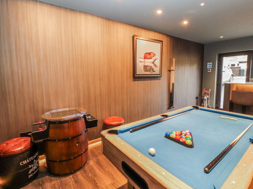 A game room with a pool table and decorative art at Bounty Boutique on the Lakes Bowness-On-Windermere