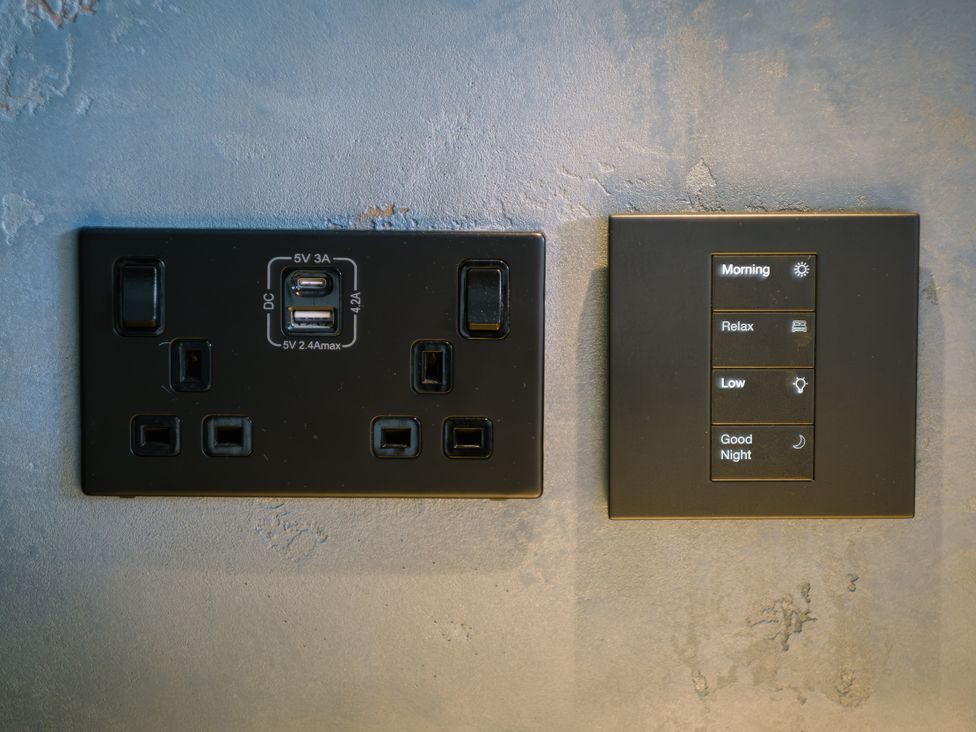 A wall switch and power outlet with USB at Bounty Boutique on the Lakes Bowness-On-Windermere