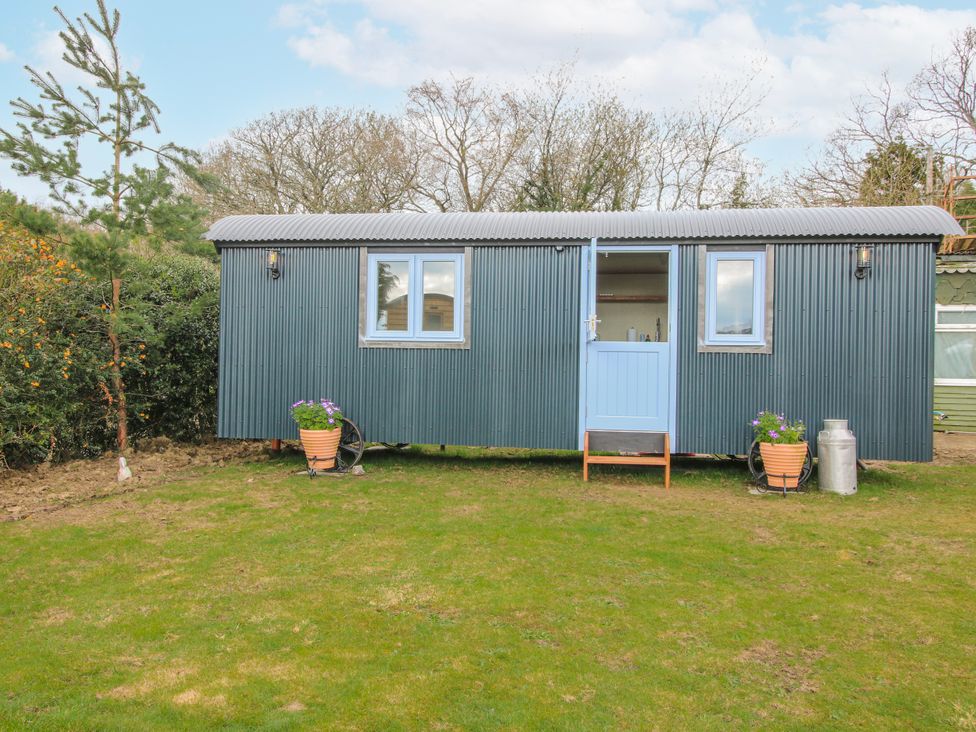 A shed with plants on the porch at Skye in Clee Hill