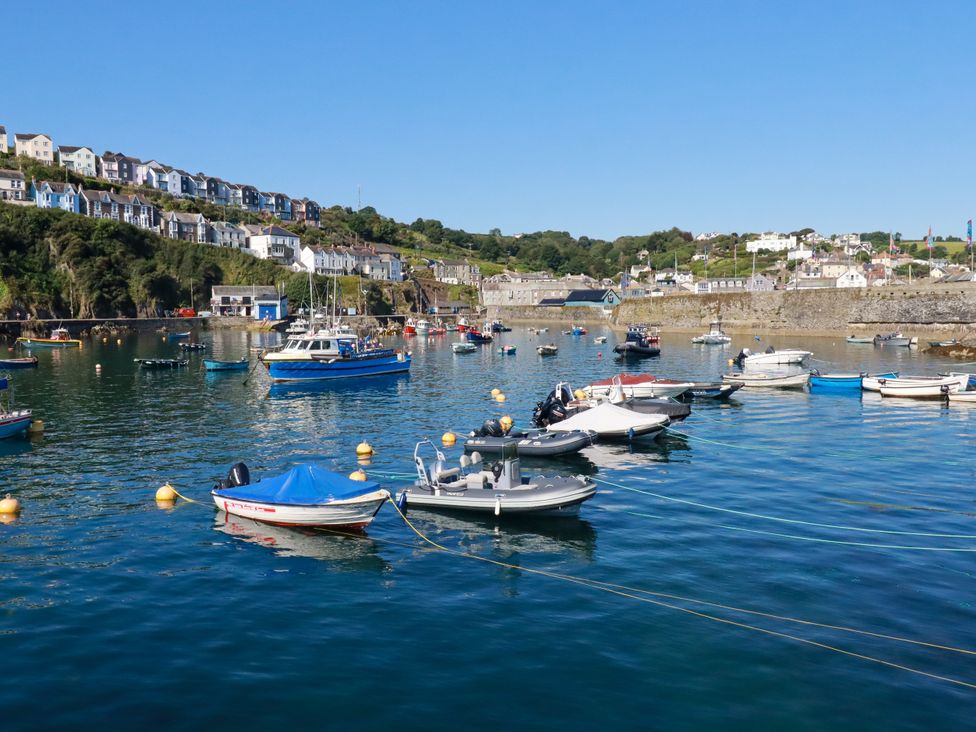 A view of boats on water at Whalebone Cottage in St. Austell