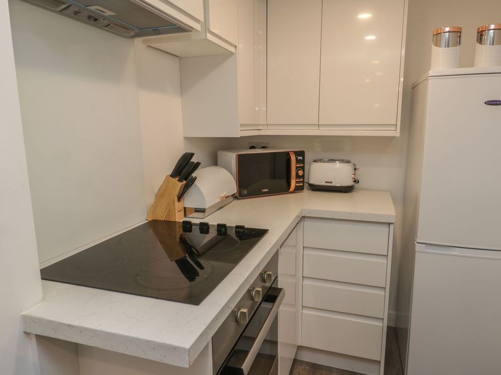 A kitchen with utensils and appliances at 47A Baxtergate in Whitby