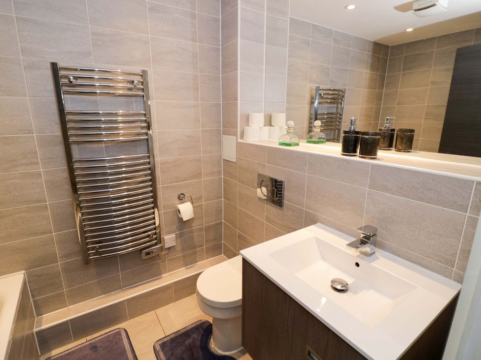 A bathroom with a sink and toilet at Apartment 15 in Birmingham