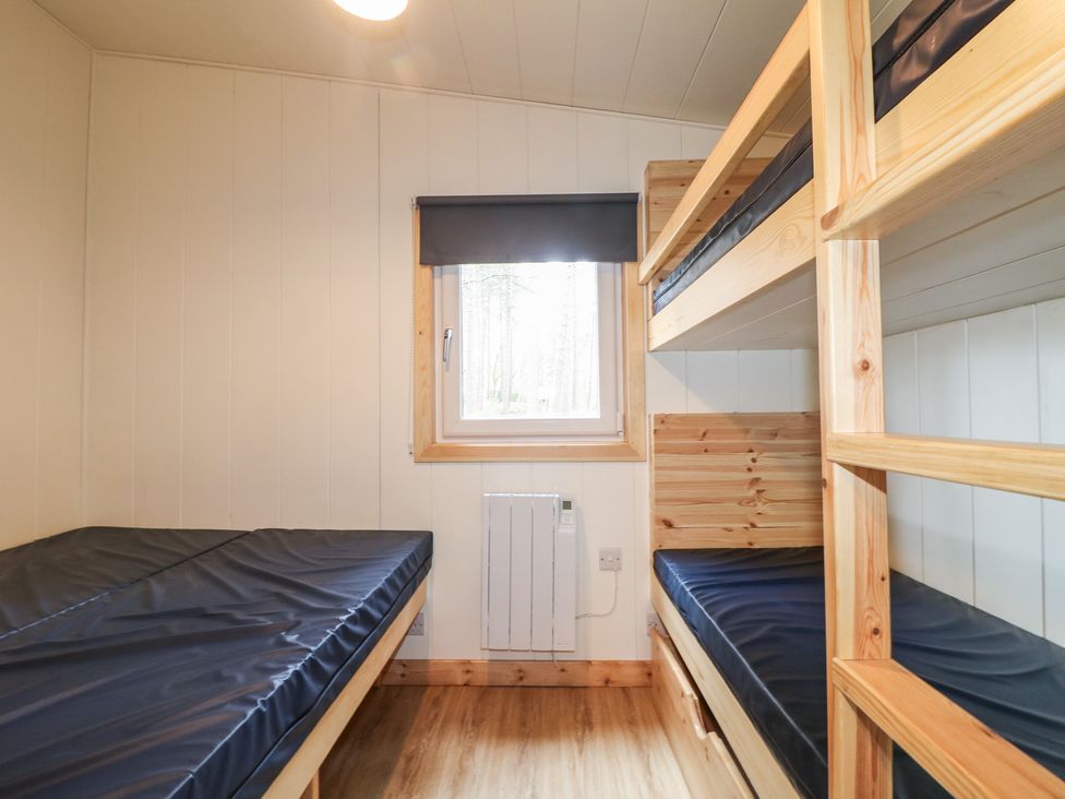 A bedroom with bunk beds and a window at Sherwood - Family Pod 1 in Mansfield