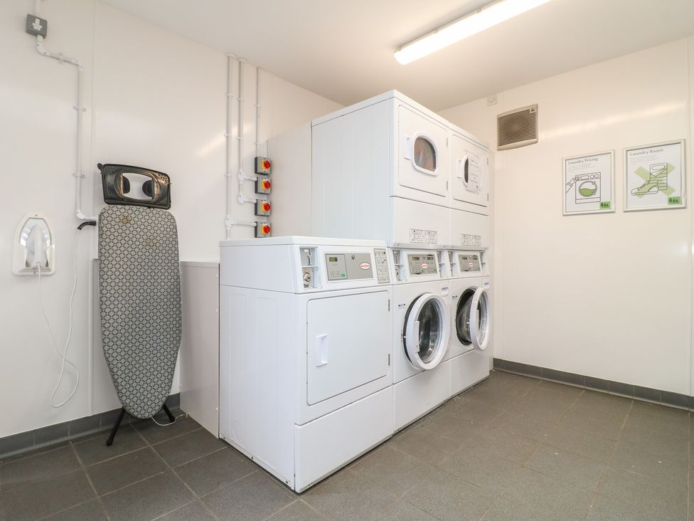 A laundry room with washing machine and dryer at Sherwood - Family Pod 1 in Mansfield