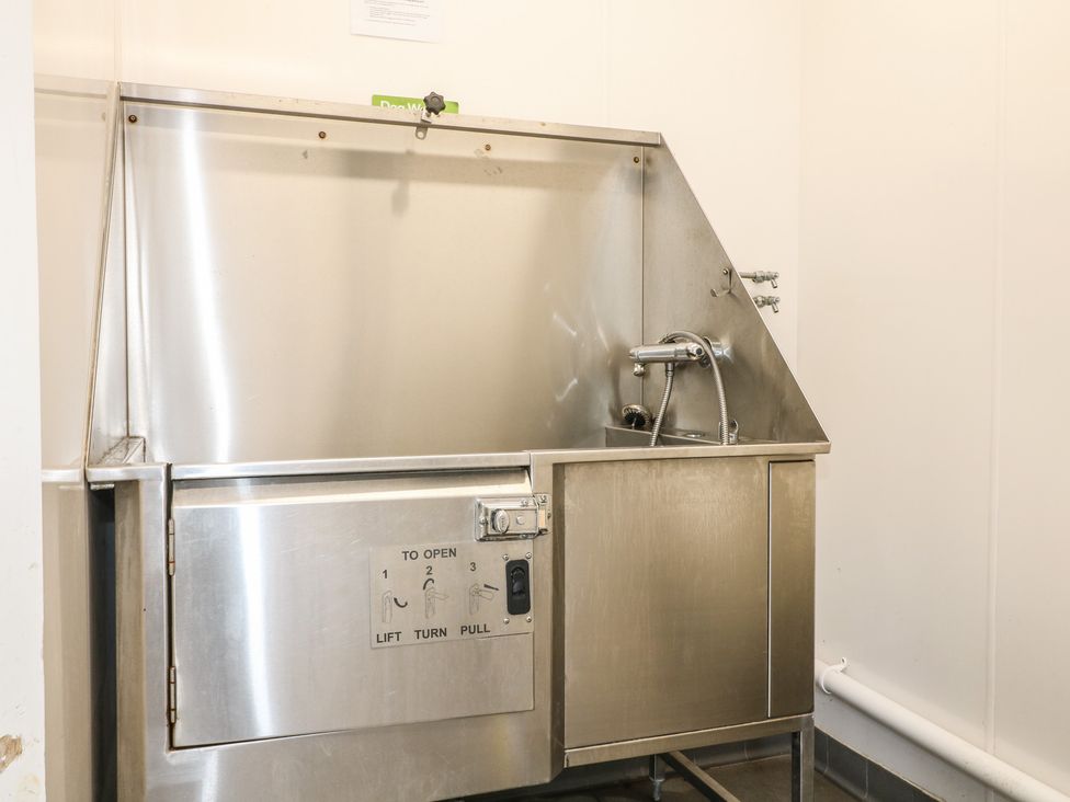 A stainless steel sink and faucet in a washroom at Sherwood - Family Pod 1 Mansfield