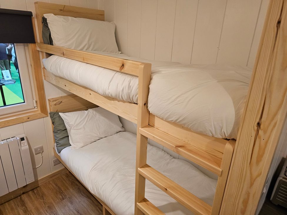 A bunk bed in a bedroom at Sherwood - Family Pod 5 in Mansfield