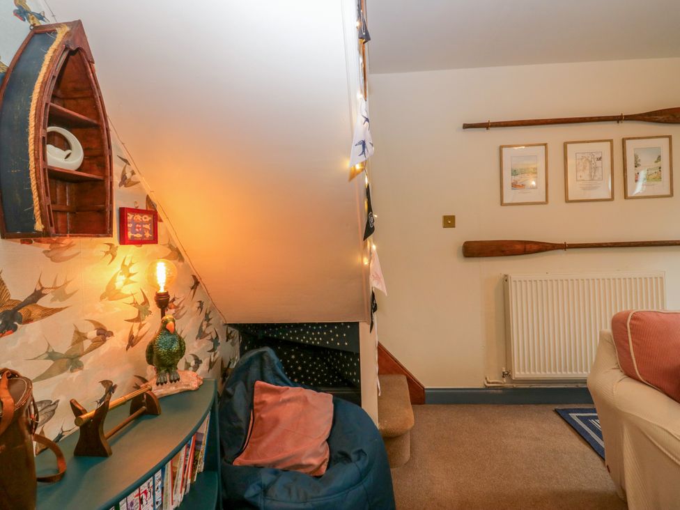 A snug area with decorative items and bean bag at Corner Cottage Lowick Green near Ulverston