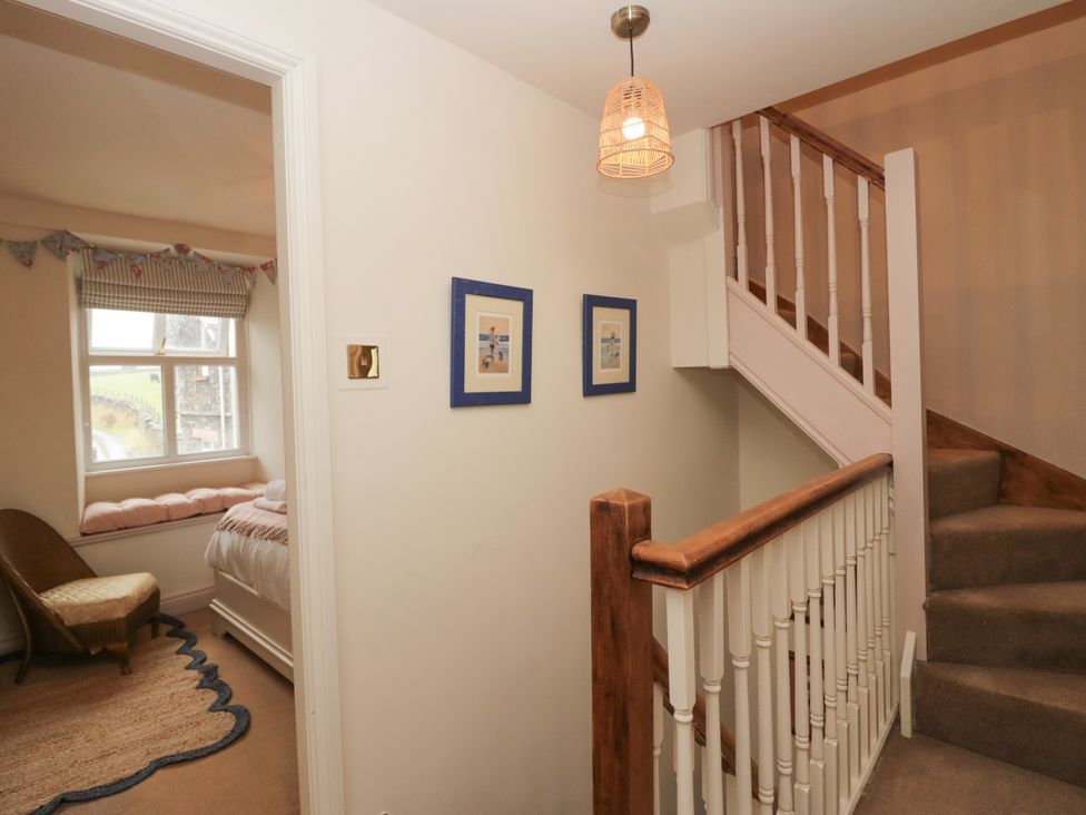 A staircase leading to upper floor in Corner Cottage Lowick Green near Ulverston