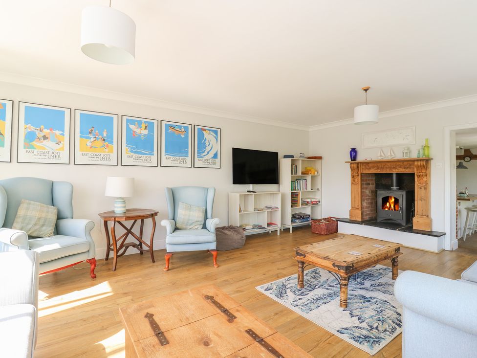A living room with armchairs and a coffee table at Beresford House in Woodbridge