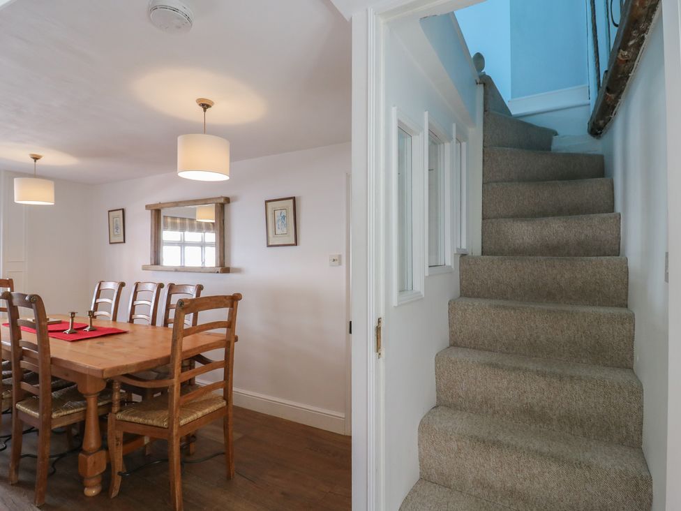 A dining room with a table and chairs at Beresford House in Woodbridge