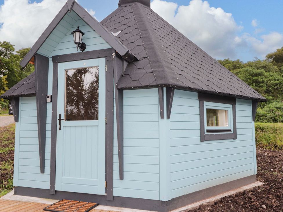 A cabin with a door and window at Little Luxe Lodges 1 in Kyle